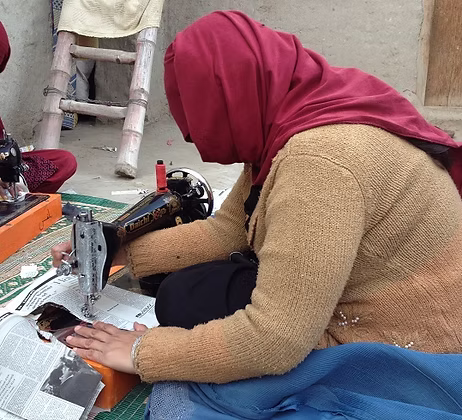 Women in vocational tailoring training